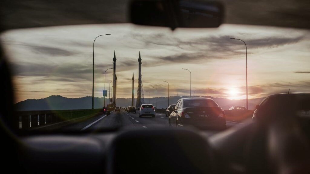 A view of sunset from a car's interior